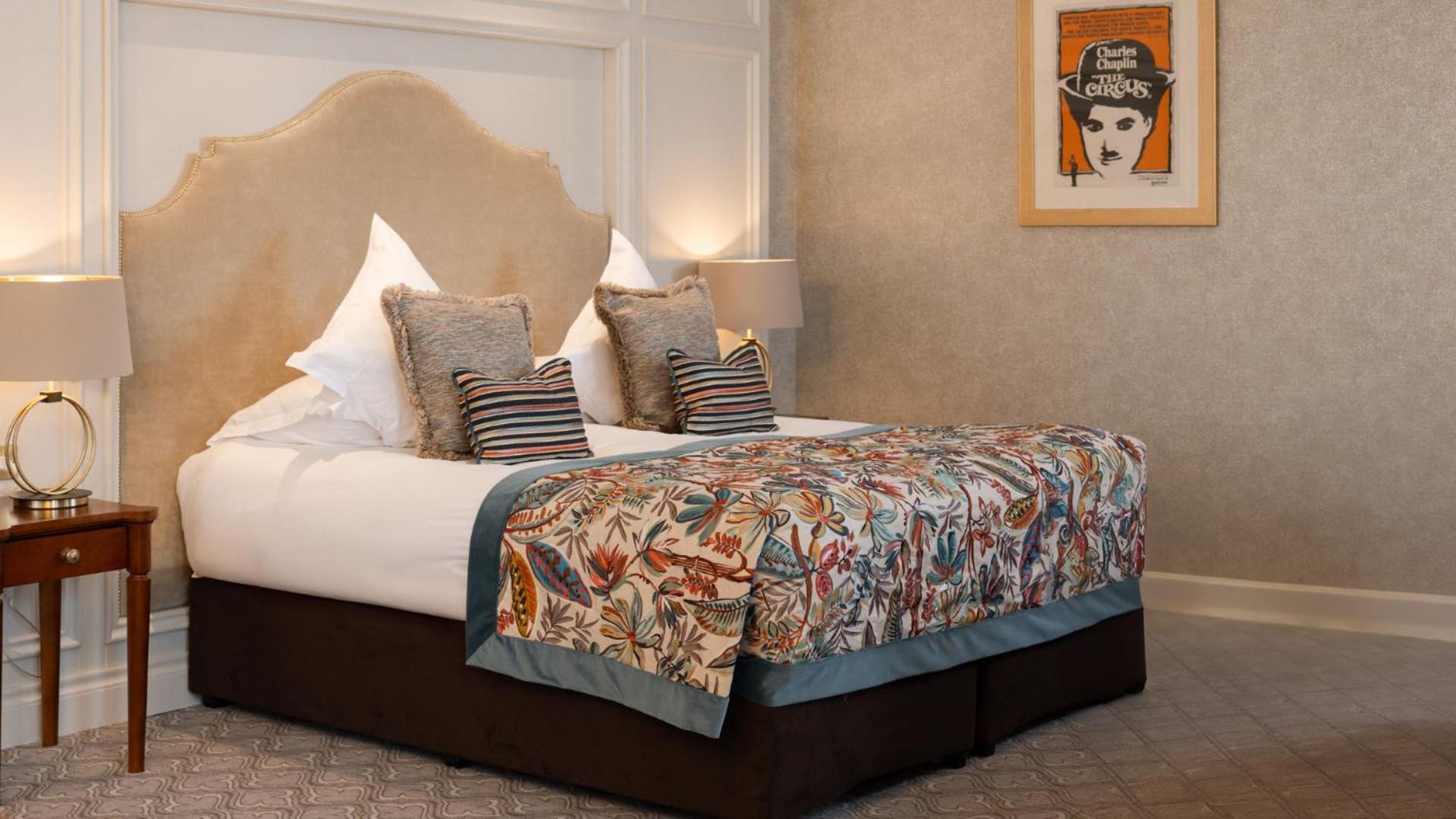 The Culloden Estate And Spa Holywood  Kültér fotó A bed with a bed frame