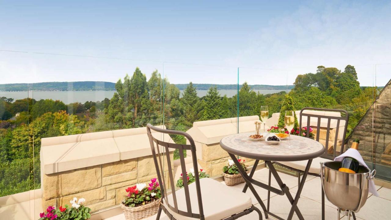 The Culloden Estate And Spa Holywood  Kültér fotó A view of the lake from the balcony of a house in the village